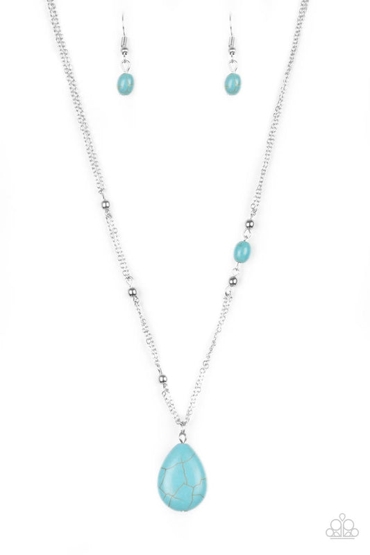 Dotted with shimmery silver beads and a dainty turquoise stone, shimmery silver chains give way to a tranquil turquoise teardrop pendant below the collar for a seasonal look. Features an adjustable clasp closure.  Sold as one individual necklace. Includes one pair of matching earrings.
