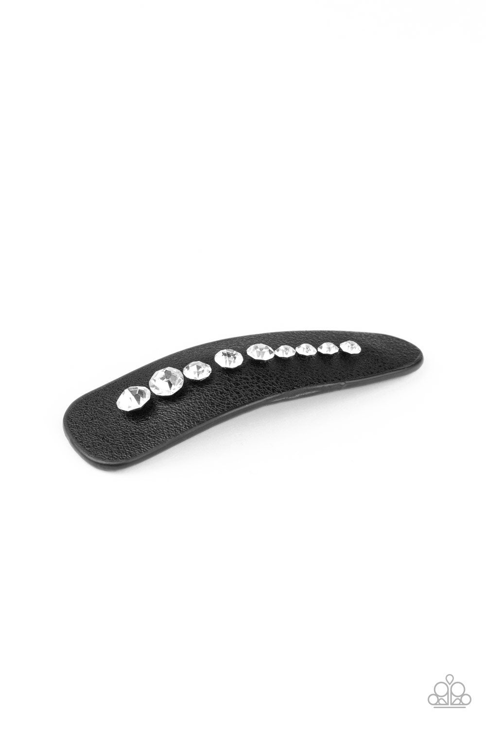 Graduating in size, a line of glassy white rhinestones is encrusted down the center of a black leather frame. Features a standard snap hair clip on the back.  Sold as one individual hair clip.