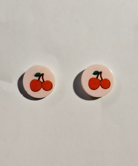 Kid's round pink earrings with cherries in center