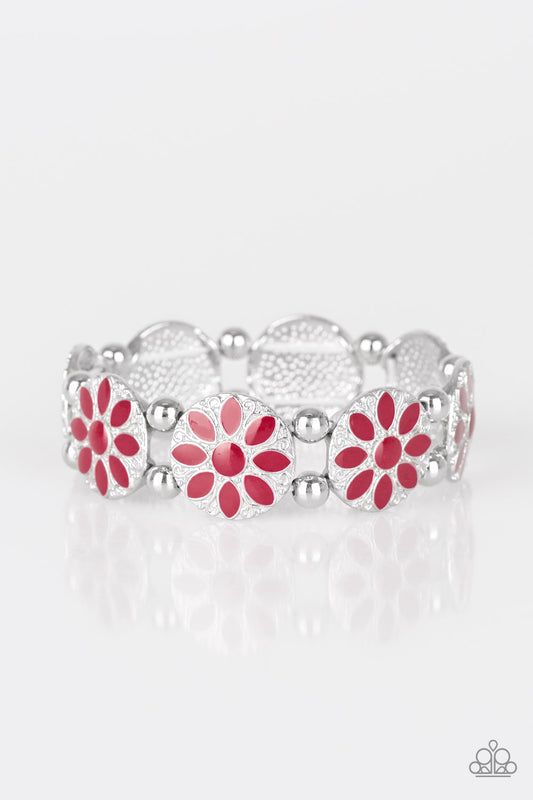 Painted in a rich red finish, ornate silver floral frames are threaded along a stretchy band across the wrist for a seasonal look.  Sold as one individual bracelet.