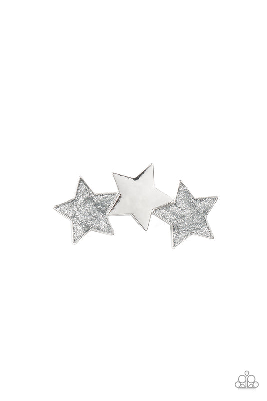 Painted in glittery silver sparkles, a sparkly pair of stars flanks a shiny silver star, coalescing into a stellar centerpiece. Features a standard hair clip.  Sold as one individual hair clip.
