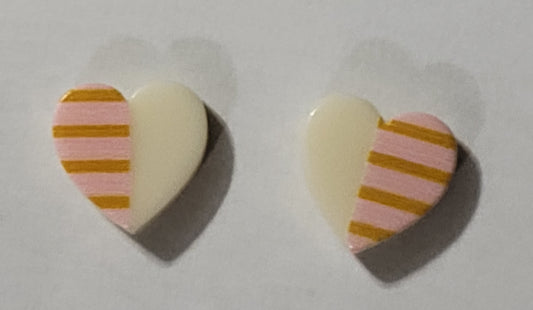 Kids' heart shaped earrings with peach with dark peach stripes on one half and white on the other