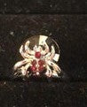 Kid's orange spider ring with red down front