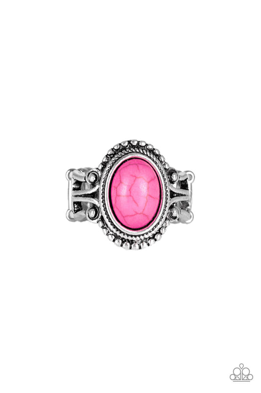 A vivacious pink stone is pressed into the center of a silver band radiating with silver studs for a seasonal look. Features a stretchy band for a flexible fit.  Sold as one individual ring.