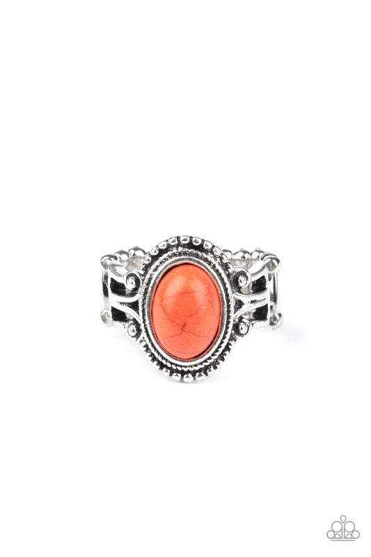 A vivacious orange stone is pressed into the center of a silver band radiating with silver studs for a seasonal look. Features a stretchy band for a flexible fit.  Sold as one individual ring.