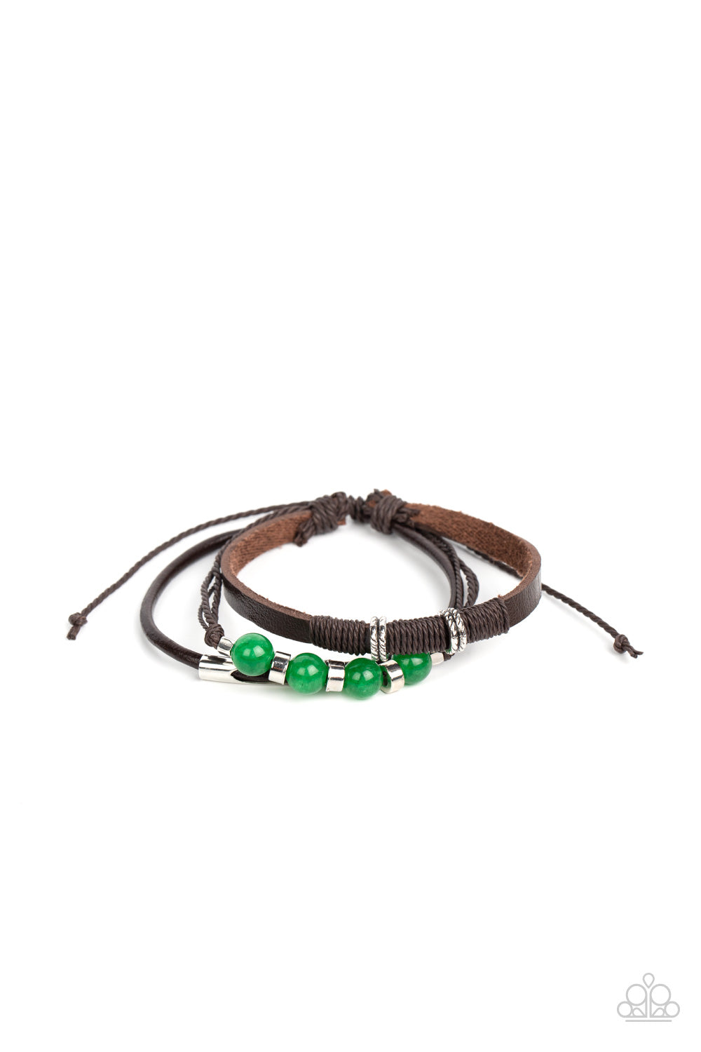 Separated by silver rings, a jade stone beaded bracelet layers with mismatched leather bands around the wrist for an adventurous fashion. Features an adjustable sliding knot closure.  Sold as one individual bracelet.