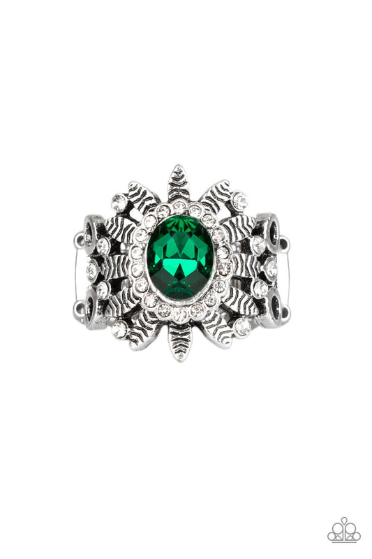 Ringed in glittery white rhinestones, a sparkling green gem is pressed into the center of a leafy silver frame. Dainty white rhinestones are sprinkled along the shimmery foliage for a refined finish. Features a stretchy band for a flexible fit. Sold as one individual ring.