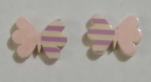 Colorful earrings in assorted colors and shapes. Featuring one striped and one polka dotted wing, the colorful butterfly frames vary in shades of pink and purple stripes. Earrings attach to standard post fittings.  Sold as one pair of post earrings.