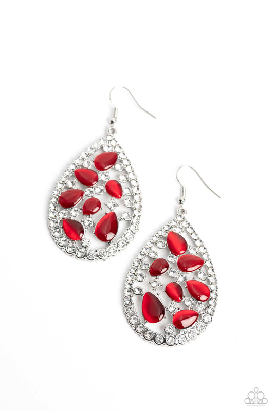Sporadically clustered against an airy, teardrop backdrop, red cat's eye stones shimmer and shine. An explosion of crystal white gems around the cat's eye stones and silver teardrop frame create additional light-catching sheen to the refined design. Earring attaches to a standard fishhook fitting.  Sold as one pair of earrings.