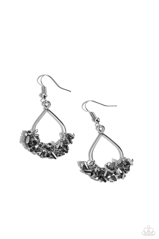 Featuring a glittery finish, a collection of chiseled hematite and smoky beads cluster at the bottom of a sleek silver teardrop frame, creating a stellar fringe. Earring attaches to a standard fishhook fitting.  Sold as one pair of earrings.