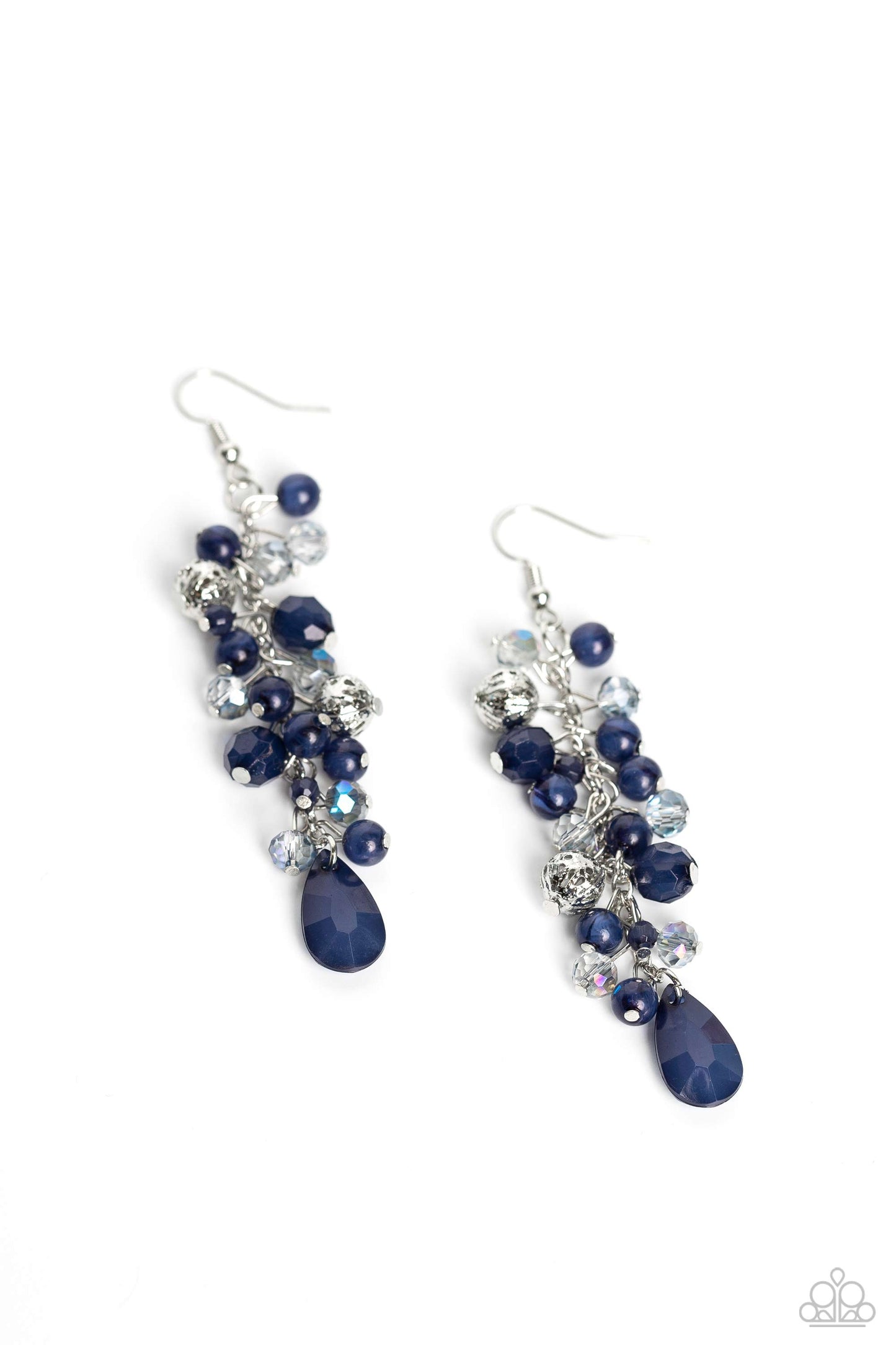 A dainty collection of blue teardrop and round beads, textured silver accents, and faceted blue crystal-like beads trickle from a single strand of silver chain, resulting in a cheekily clustered chandelier. Earring attaches to a standard fishhook fitting.  Sold as one pair of earrings.