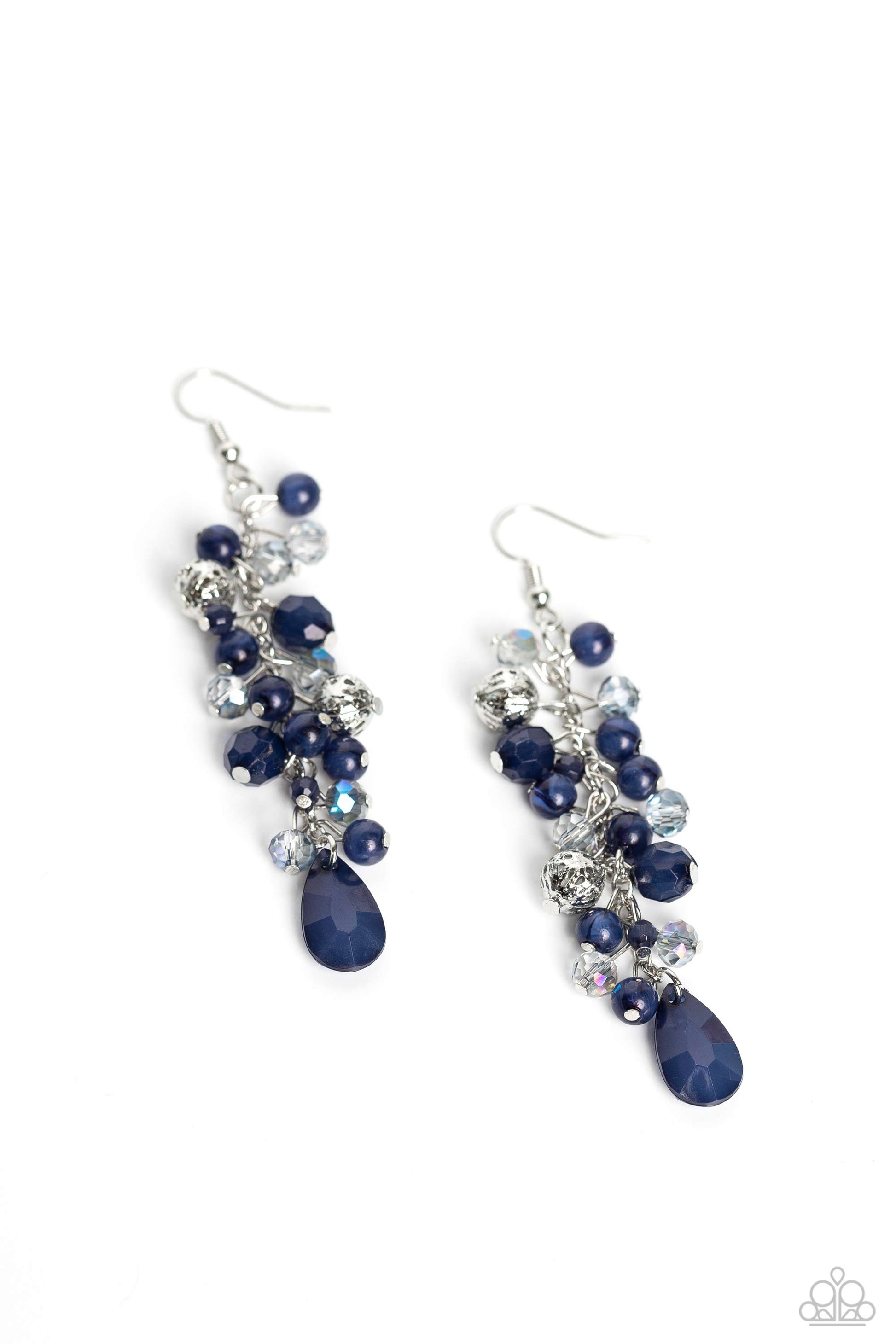 A dainty collection of blue teardrop and round beads, textured silver accents, and faceted blue crystal-like beads trickle from a single strand of silver chain, resulting in a cheekily clustered chandelier. Earring attaches to a standard fishhook fitting.  Sold as one pair of earrings.