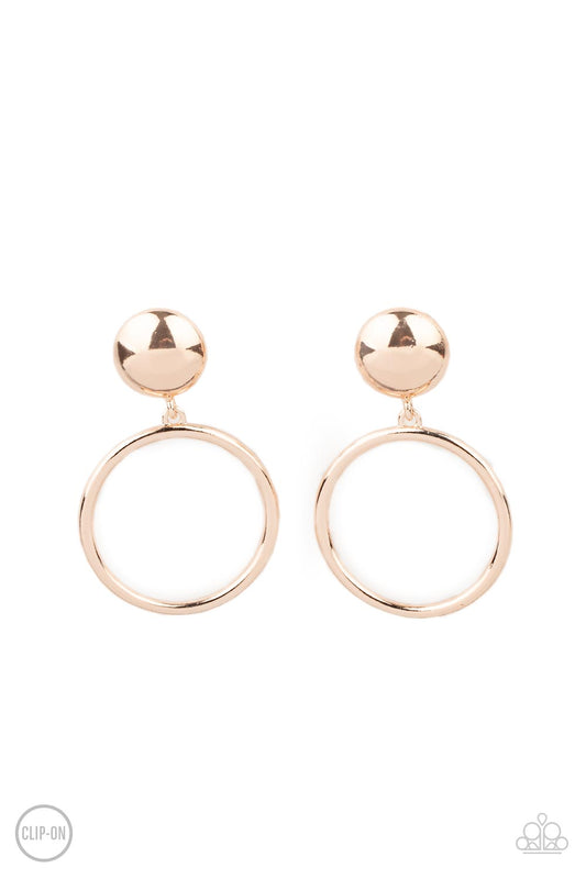 A shiny rose gold hoop swings from the bottom of an oversized rose gold stud for a classic metallic look. Earring attaches to a standard clip-on fitting.  Sold as one pair of clip-on earrings.