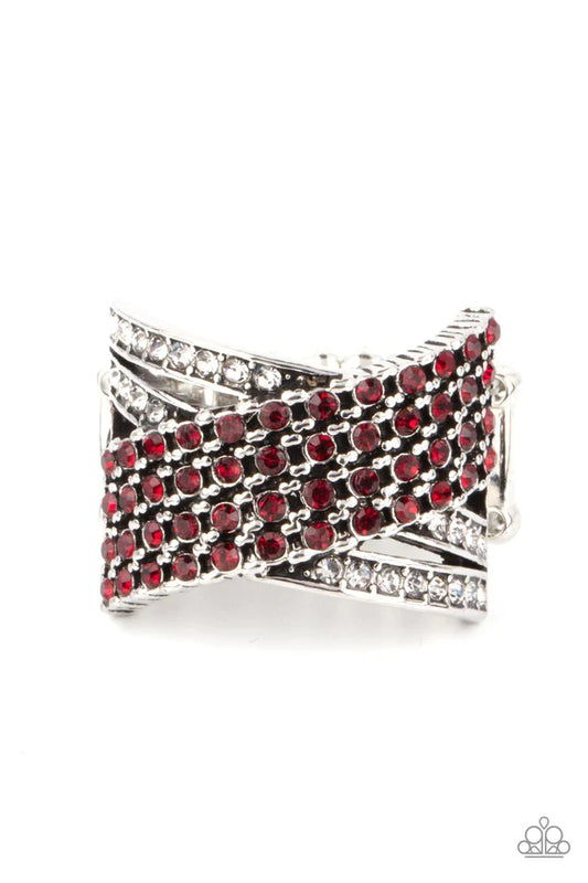 Glittery red rhinestones dot sections of dainty sections of silver chain that slant across rows of white rhinestone encrusted bands, coalescing into an edgy centerpiece. Features a stretchy band for a flexible fit.  Sold as one individual ring.