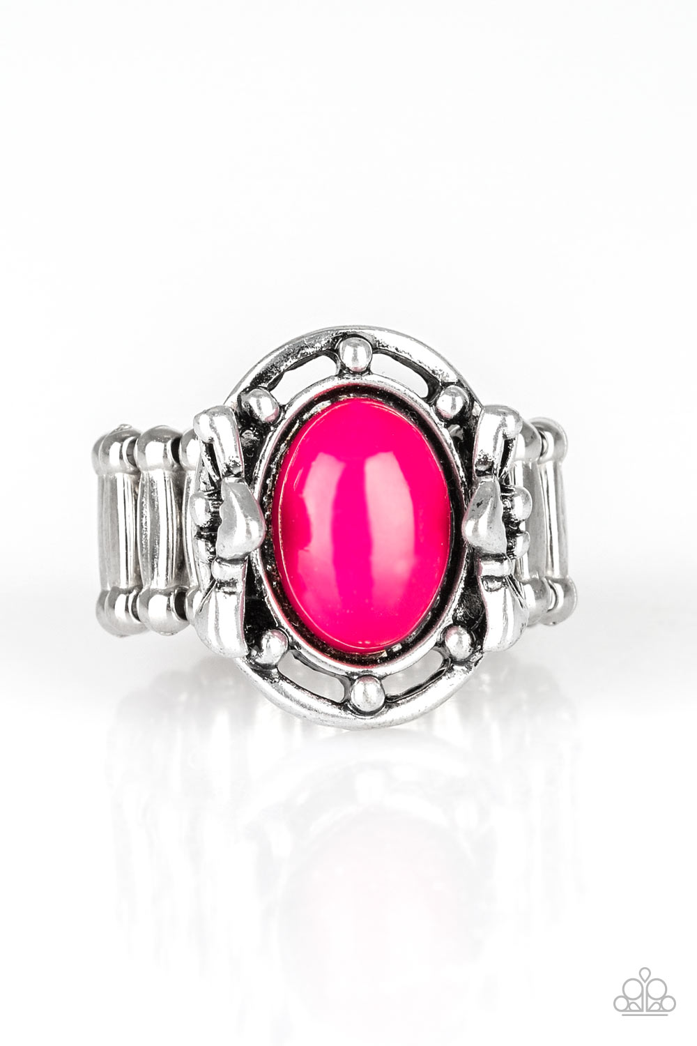 A polished pink bead is pressed into the center of a silver frame blooming with floral details for a whimsical finish. Features a stretchy band for a flexible fit.  Sold as one individual ring.