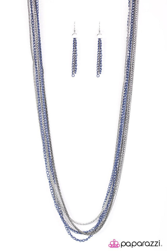 Brushed in a metallic finish, blue chains collide with mismatched gunmetal and silver chains across the chest. Shimmery silver and gunmetal popcorn chains join the colorful layers, adding shimmery metallic texture to the spunky mixed palette. Features an adjustable clasp closure.  Sold as one individual necklace. Includes one pair of matching earrings.