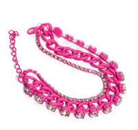 A collection of mismatched pink-painted chains collide with bold-faceted white gems in pronged pink-painted fittings and a daintier strand of rhinestones in the same fittings for a colorfully constructed look. Features an adjustable clasp closure.  Sold as one individual bracelet.