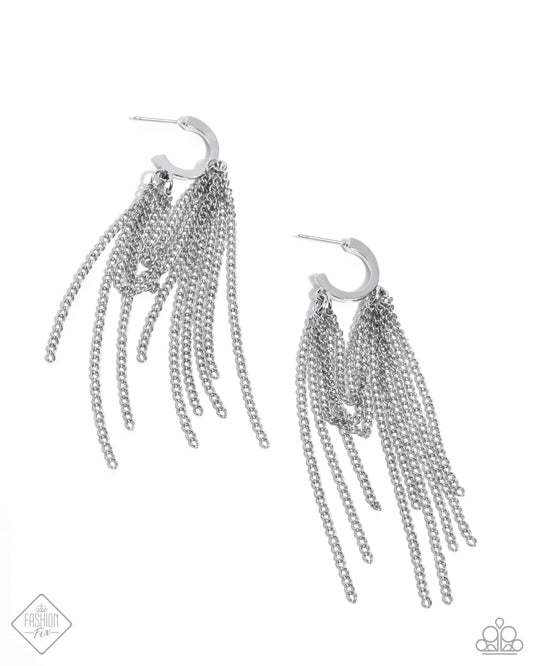 Attached in two places along a sleek dainty silver hoop, copious amounts of classic silver chains loop and taper below the ear for an endlessly edgy display. Earring attaches to a standard post fitting. Hoop measures approximately 1/2" in diameter.  Sold as one pair of hoop earrings.