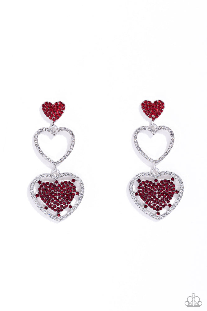 A red rhinestone-encrusted silver heart, white rhinestone-encrusted silver heart frame, and white and red rhinestone-encrusted layered heart frame gradually increase in size as they delicately interconnect and stack into a dazzling lure for an elegant effervescence. Earring attaches to a standard post fitting.  Sold as one pair of post earrings.