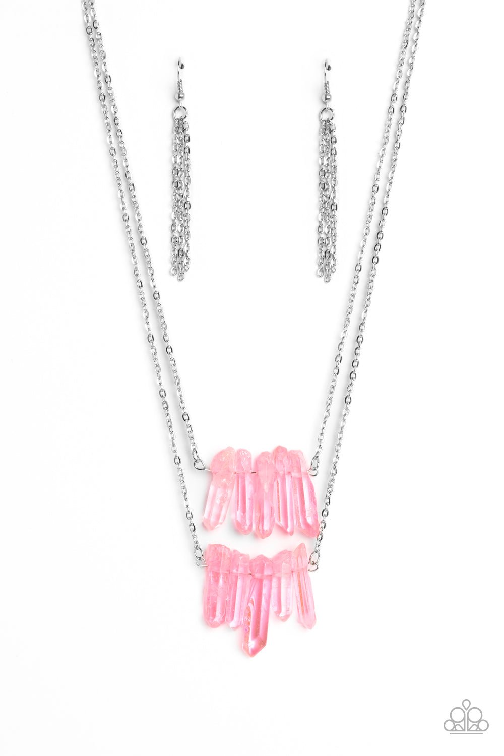 Chiseled into a colorful collection, two layers of transparent pink crystal-like stones swings from the bottom of two dainty silver chains for a handcrafted, artisanal look. Features an adjustable clasp closure. As the stone elements in this piece are natural, some color variation is normal.  Sold as one individual necklace. Includes one pair of silver fringe earrings.
