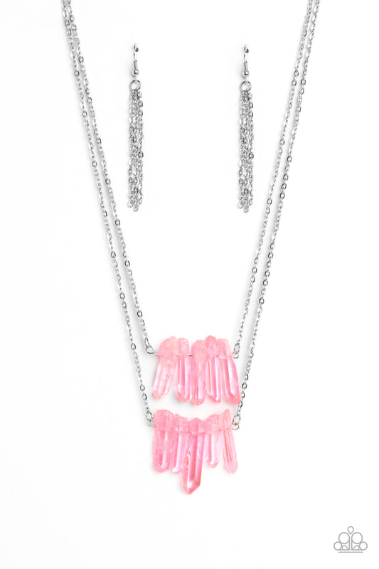 Chiseled into a colorful collection, two layers of transparent pink crystal-like stones swings from the bottom of two dainty silver chains for a handcrafted, artisanal look. Features an adjustable clasp closure. As the stone elements in this piece are natural, some color variation is normal.  Sold as one individual necklace. Includes one pair of silver fringe earrings.