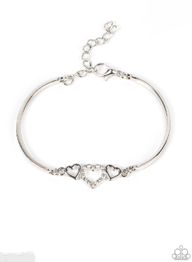 Two shiny silver hearts flank a white rhinestone dotted heart at the center of two curved silver bars, linking into a flirtatious centerpiece around the wrist. Features an adjustable clasp closure.  Sold as one individual bracelet.