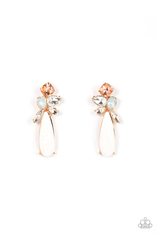 Featuring various cuts, a glitzy collection of white, peach, and opal rhinestones delicately cluster into a sparkly fitting. Featuring a glittery white lacquer backdrop, an acrylic teardrop swings from the bottom of the effervescent frame for an ethereal finish. Earring attaches to a standard post fitting.  Sold as one pair of post earrings.