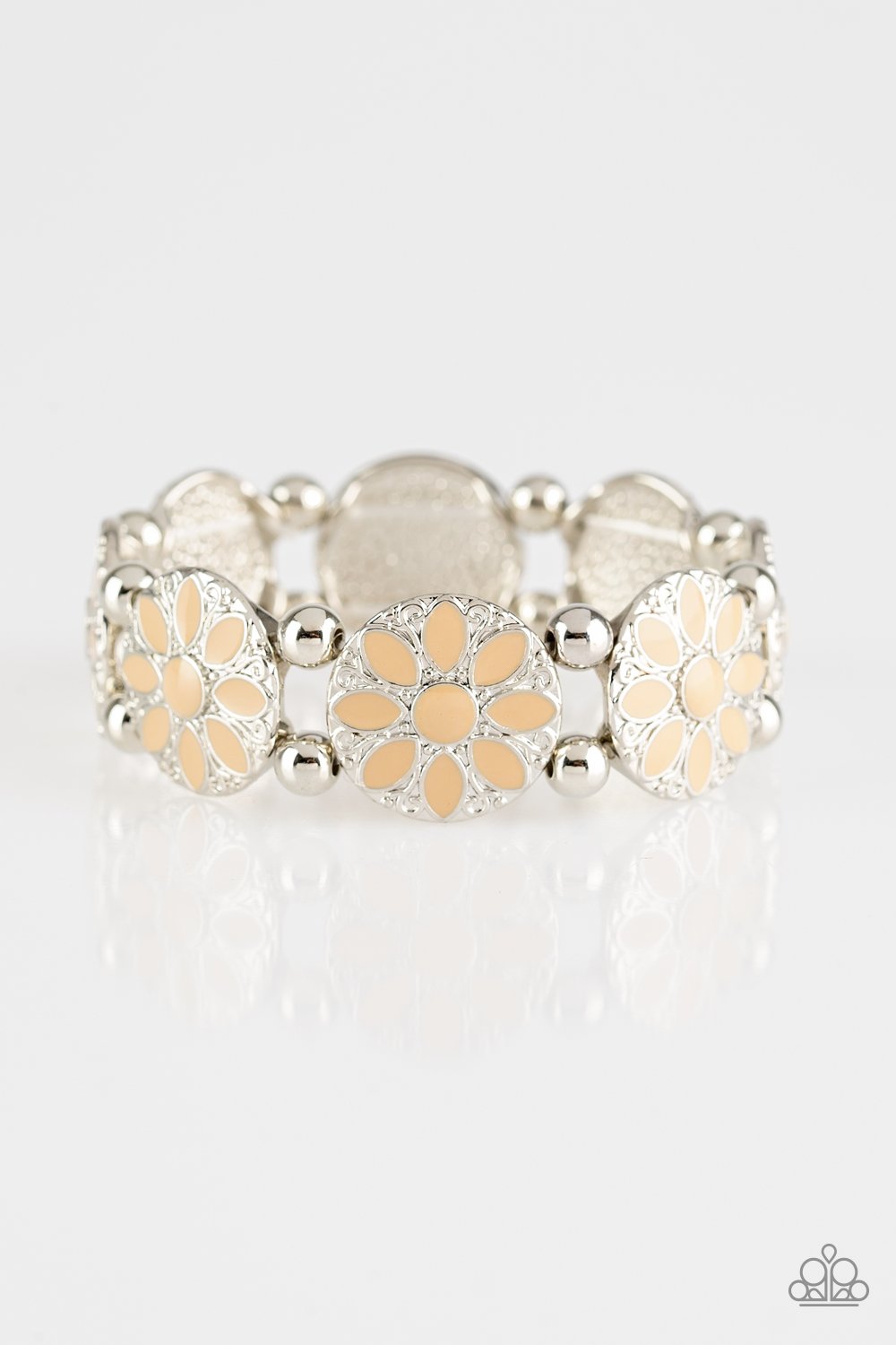 Painted in a neutral brown finish, ornate silver floral frames are threaded along a stretchy band across the wrist for a seasonal look.  Sold as one individual bracelet.