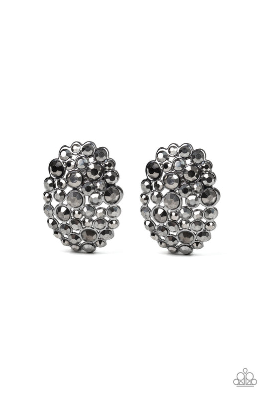 A collision of glittery hematite rhinestones coalesce into a sparkling frame for a blinding look.  Earring attaches to a standard post fitting. Sold as one pair of post earrings.