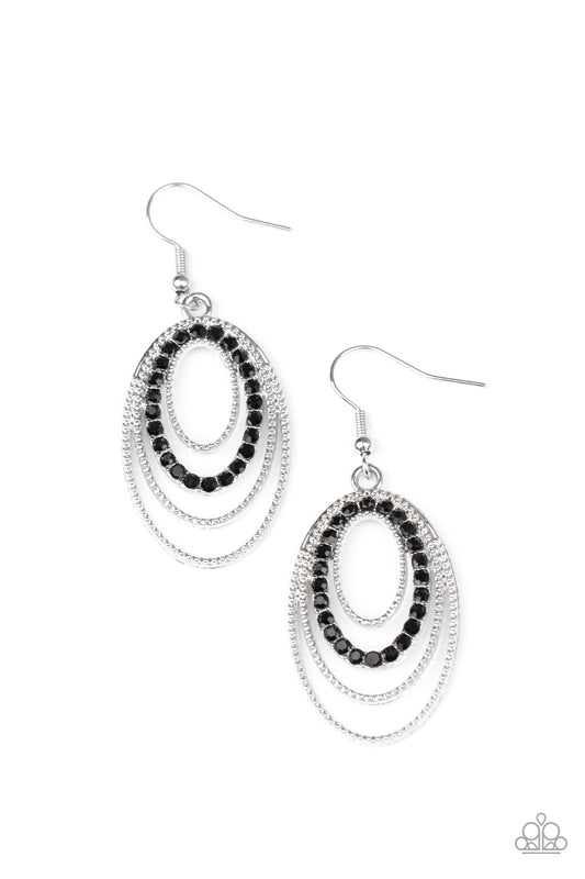 A ring of glittery black rhinestones and studded silver ovals ripple out into a glittery lure. Earring attaches to a standard fishhook fitting.  Sold as one pair of earrings.