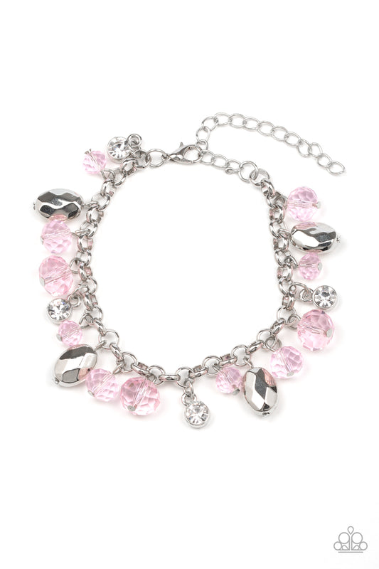 A glittery collection of sparkling white rhinestones, faceted silver beads, and glassy pink crystal-like beads dangle from the wrist, creating a refined fringe. Features an adjustable clasp closure.

Sold as one individual bracelet.