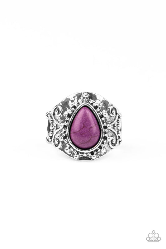 Chiseled into a tranquil teardrop, a Magenta Purple stone is pressed into the center of a thick silver band studded and embossed in whimsical details for a seasonal look. Features a stretchy band for a flexible fit.  Sold as one individual ring.