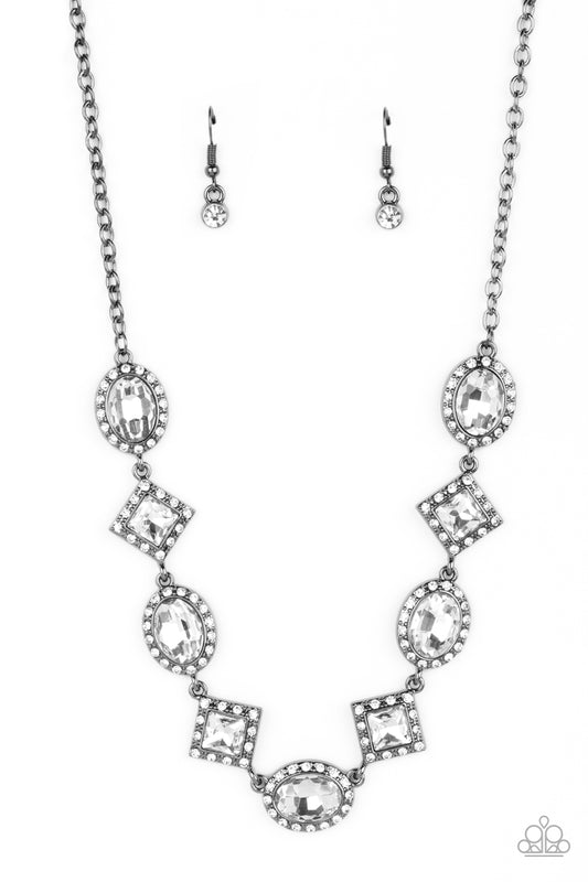 Dazzling white rhinestones, in both oval and square cuts, fall along the collar in an alternating pattern. Each gem is set against a backdrop of gunmetal and bordered by tiny white rhinestones, amplifying their sparkle. In a dramatic finish, the square-cut gems are tilted on a point to maximize their impact. Features an adjustable clasp closure.  Sold as one individual necklace. Includes one pair of matching earrings.