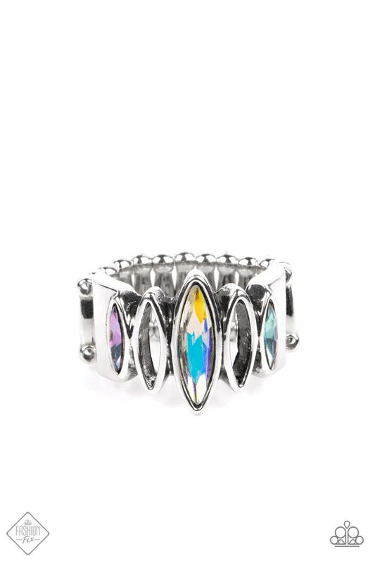 Featuring a stellar iridescence, marquise cut rhinestones alternate with airy silver marquise frames across the finger, coalescing into a futuristic sparkle. Features a stretchy band for a flexible fit. Due to its prismatic palette, color may vary.  Sold as one individual ring.