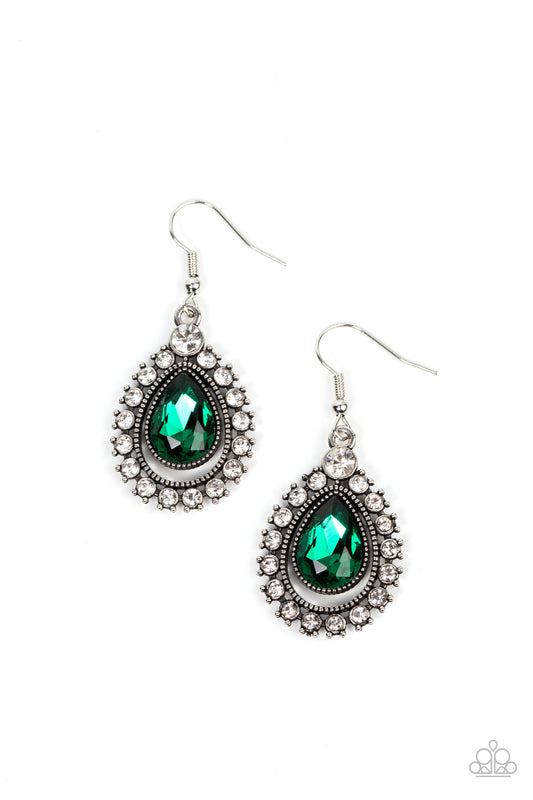 Featuring a silver studded fitting, a glittery green teardrop gem radiates inside of a studded silver teardrop that is bordered in glassy white rhinestones for a glamorous finish. Earring attaches to a standard fishhook fitting.  Sold as one pair of earrings.