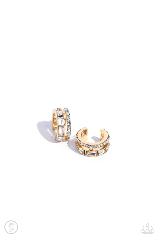 Two glistening gold bars arc across the ear, coalescing into a layered, adjustable, one-size-fits-all cuff. Dainty white rhinestones dust across the uppermost band, while emerald-cut white gems are encrusted along the lowermost band for a regal look.  Sold as one pair of cuff earrings.