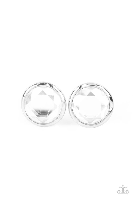 Featuring a flashy faceted finish, an oversized white gem is pressed into a sleek silver fitting for a dramatic pop of dazzle. Earring attaches to a standard post fitting.  Sold as one pair of post earrings.