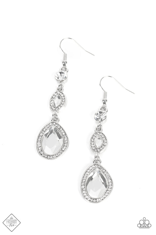 Bordered in silver frames dotted with tiny flecks of white rhinestones, a pair of asymmetrical white gems delicately link into a spellbinding sparkle around the ear. Earring attaches to a standard fishhook fitting.  Sold as one pair of earrings.