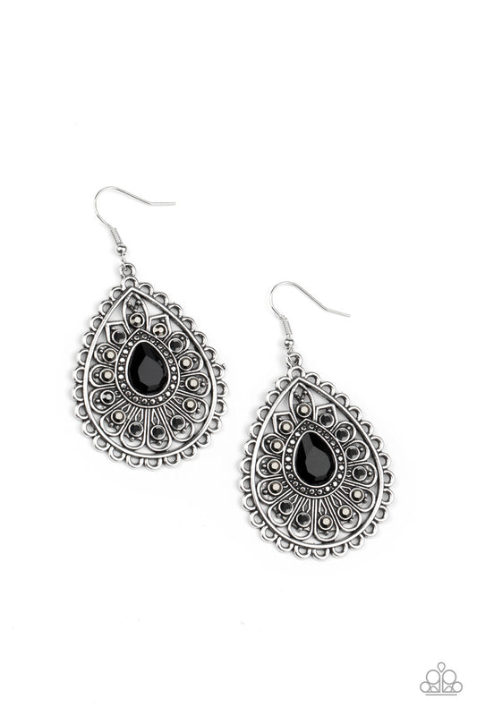 Hematite rhinestone dotted silver petals flare out from a black teardrop rhinestone center, coalescing into a frilly frame. Earring attaches to a standard fishhook fitting.  Sold as one pair of earrings.
