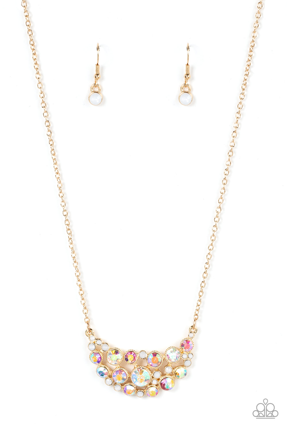 An effervescent collection of opal and iridescent rhinestones delicately join into a bubbly half moon pendant at the bottom of a dainty gold chain, resulting in a sparkly statement piece below the collar. Features an adjustable clasp closure.  Sold as one individual necklace. Includes one pair of matching earrings.