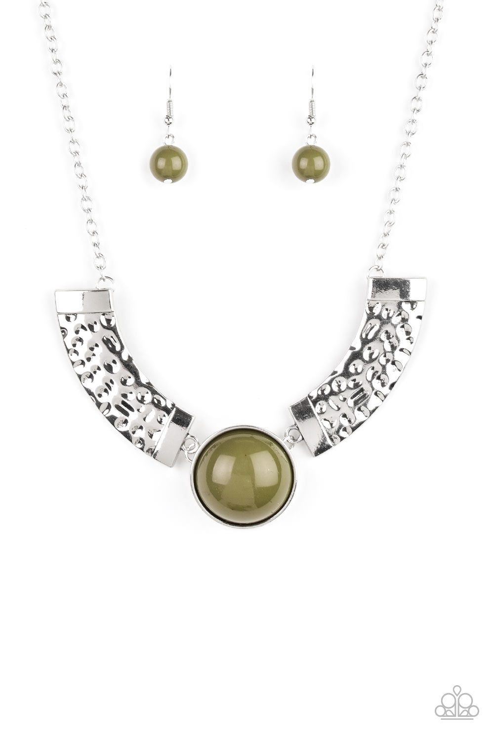 Dramatic silver plates connect with a shiny green beaded center, creating an indigenous collar-like pendant. The shiny silver plates are delicately hammered, adding a flashy metallic texture to the tribal inspired palette. Features an adjustable clasp closure.  Sold as one individual necklace. Includes one pair of matching earrings.