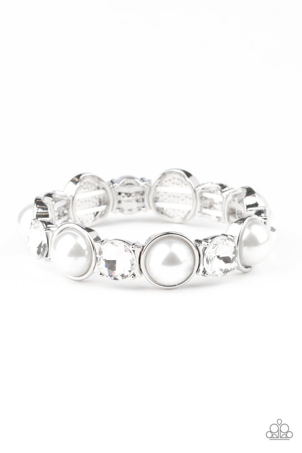 Featuring sleek silver fittings, bubbly white pearls and oversized white rhinestones are delicately threaded along stretchy bands around the wrist for a refined flair.

Sold as one individual bracelet.