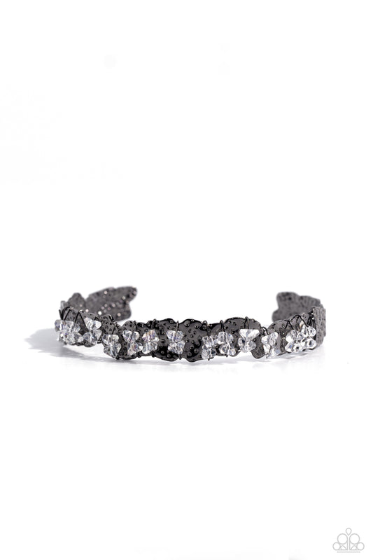 Women's black bracelet with white bead chips
