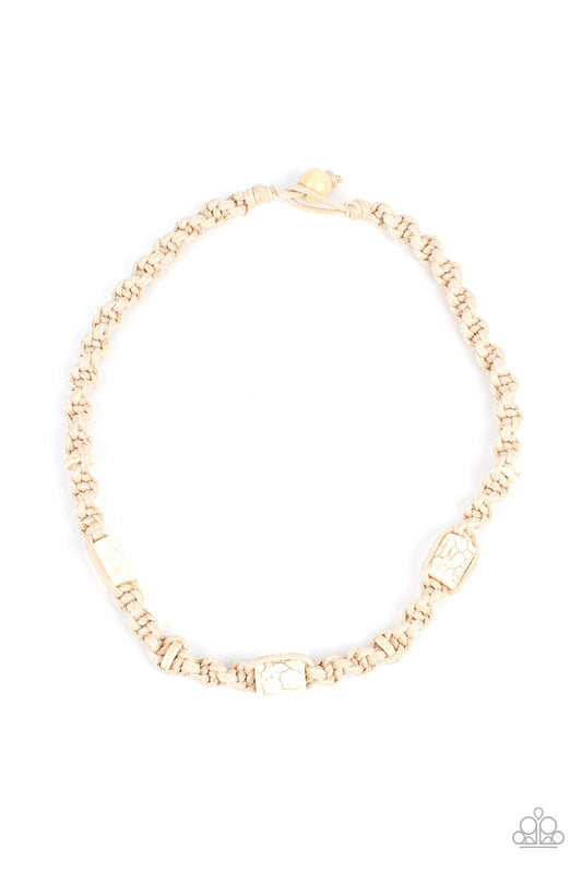 Three cylindrical white stones and small flat stone accents are thoughtfully woven into a macramé style necklace. The natural cord is knotted into a chunky spiral design creating a homespun sensation below the collar. Features a button loop closure.  Sold as one individual necklace.