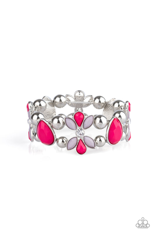 Featuring pink and Paloma beaded petals, white rhinestone dotted floral frames, shiny silver beads, and faceted pink teardrop beads are threaded along stretchy bands around the wrist for a glamorous look.  Sold as one individual bracelet.