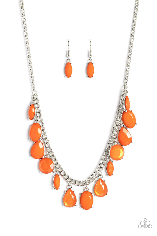 Featuring oval, round, teardrop, and marquise cuts, a fanciful collection of opaque and translucent orange beads sways from a bold silver chain. The faceted beads are set in silver prong settings, giving a spunky vibe to the whimsical collection as it lays below the collar. Features an adjustable clasp closure.  Sold as one individual necklace. Includes one pair of matching earrings.