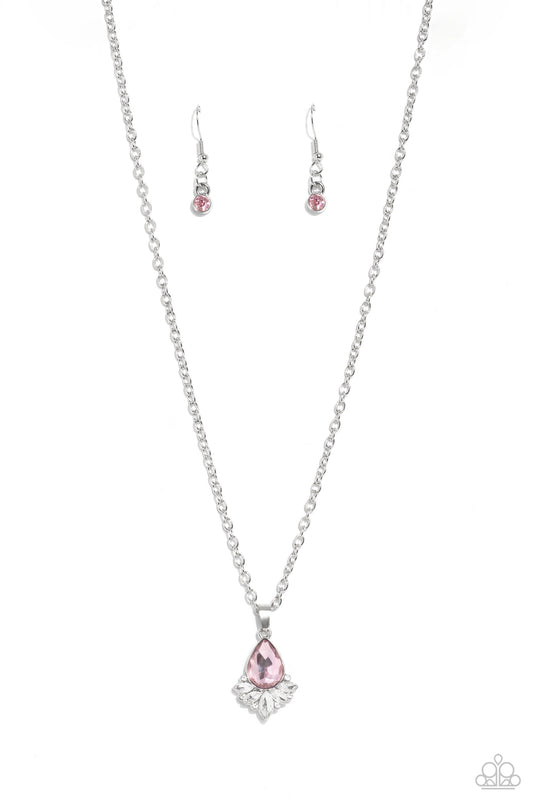 Expanding out from a solitaire pink teardrop gem, a fringe of dainty marquise-cut and round-cut white gems and rhinestones shimmers and shines for a refined display of elegance. Features an adjustable clasp closure.  Sold as one individual necklace. Includes one pair of matching earrings.