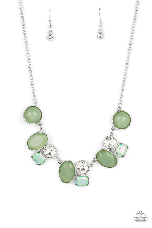 Opaque Basil beads in perfectly polished circles and faceted ovals are pressed into silver frames as they connect with exaggerated classic white rhinestones stacked above emerald cut iridescent gems to create an intricate geometric display. Features an adjustable clasp closure. Due to its prismatic palette, color may vary.  Sold as one individual necklace. Includes one pair of matching earrings.
