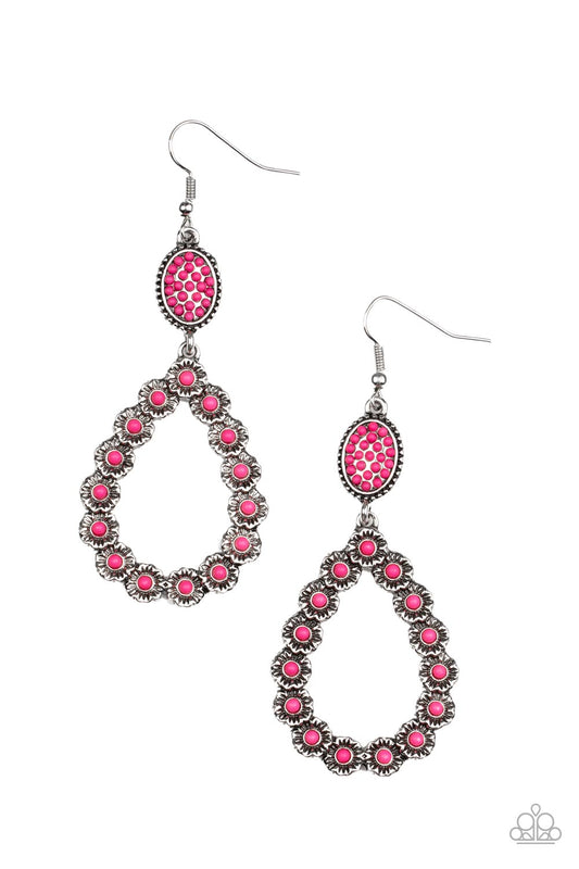 Dotted with dainty Fuchsia Fedora beaded centers, rustic silver floral frames delicately connect into a whimsical teardrop at the bottom of a matching Fuchsia Fedora beaded oval frame. Earring attaches to a standard fishhook fitting.  Sold as one pair of earrings.