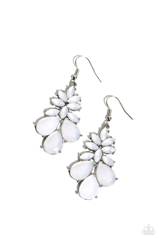 A collection of opalescent white teardrop and marquise cut glassy beads coalesce into a glamorous lure, resulting in a mystical pop of color. Earring attaches to a standard fishhook fitting.  Sold as one pair of earrings.